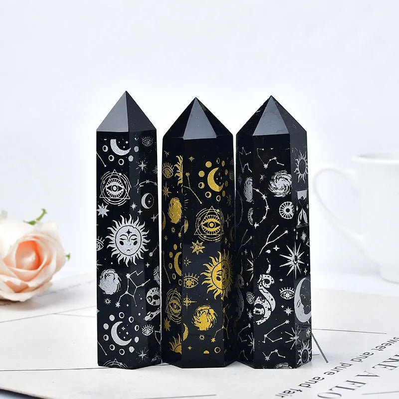 natural obsidian pointing tower crystal engraved with witchy sun and moon pattern roomtery